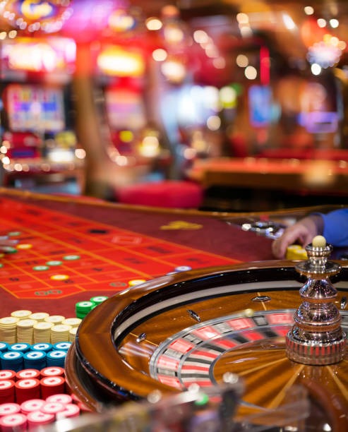 Live French Roulette table with dealer and wheel on watitoto platform